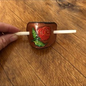 Hair pony adornment. Real leather with antler stick. Custom tooling.